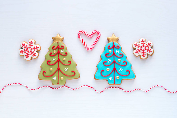 Christmas homemade gingerbread snowflake  and christmas tree coo - Photo, Image
