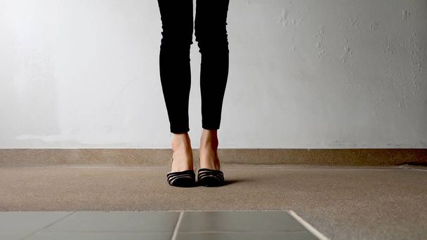 Close up of Stylish Female Black Shoes. Footwear on Floor  - Foto, imagen
