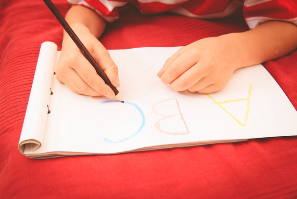 little boy learning to write letters - Foto, Imagen