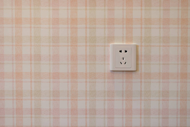 электрическая розетка на стене - Фото, изображение