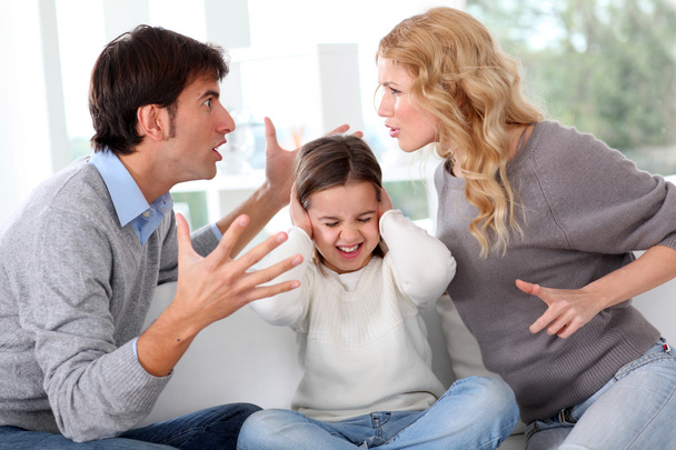 Couple fighting in front of child - Foto, imagen
