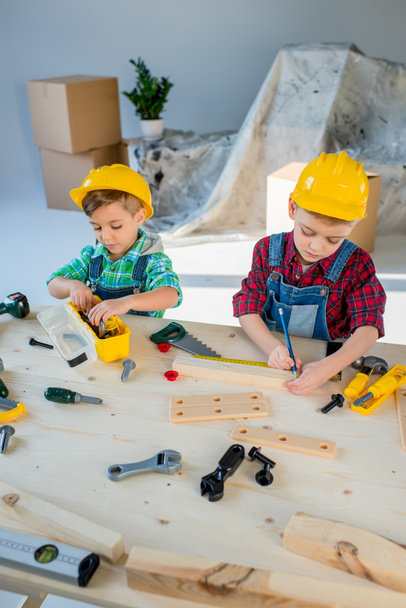 Little boys with tools - Фото, изображение