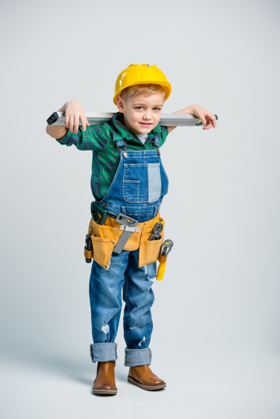 Little boy in tool belt  - Foto, afbeelding