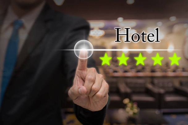Businessman pointing five star button - Photo, Image