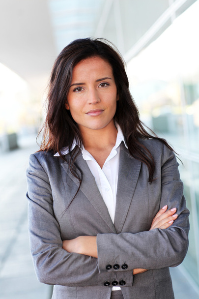 Portrait of beautiful businesswoman standing outside - Фото, изображение