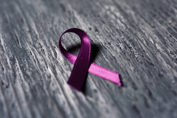 pink ribbon on a wooden surface - Foto, Imagem