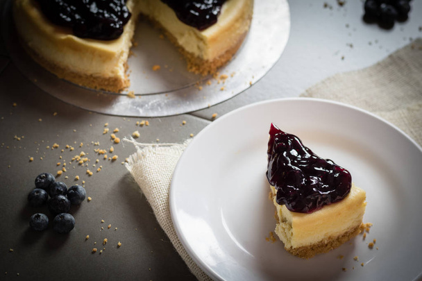 piece of freshness delicious blueberry cheese cake on plate - Foto, Imagem