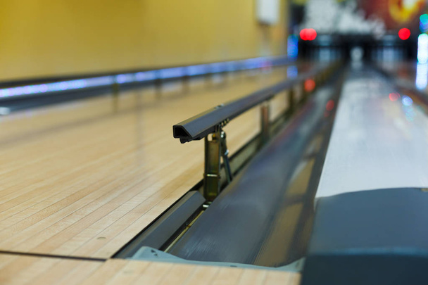 Bowling alley background, lane with bumper rails - Photo, Image