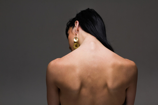 naked back of a beautiful brunette woman - 写真・画像