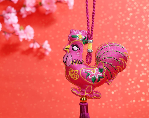 Tradition Chinese knot: Cloth doll Rooster,Chinese calligraphy T - Photo, Image