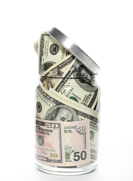 Dollars in a glass jar - Foto, afbeelding
