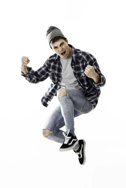 young man jumper - Фото, изображение