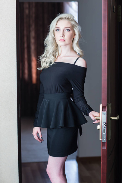 elegant woman in black dress - Фото, изображение