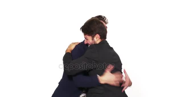 Two elegant dressed men celebrating success together - Filmati, video
