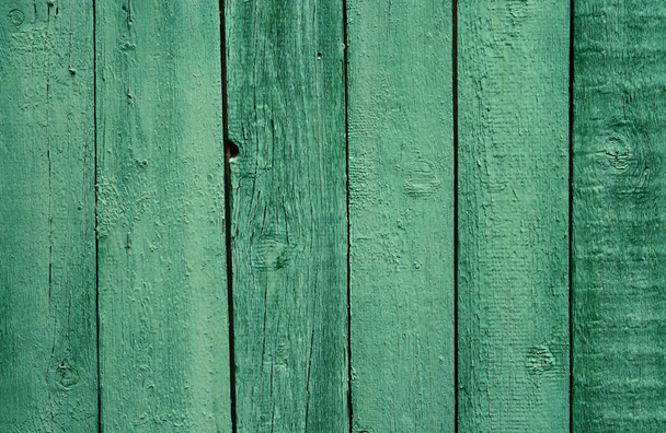 Old wooden green painted fence, beautiful background for your design - Фото, зображення