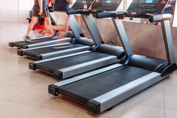 four treadmills in a gym - Photo, Image
