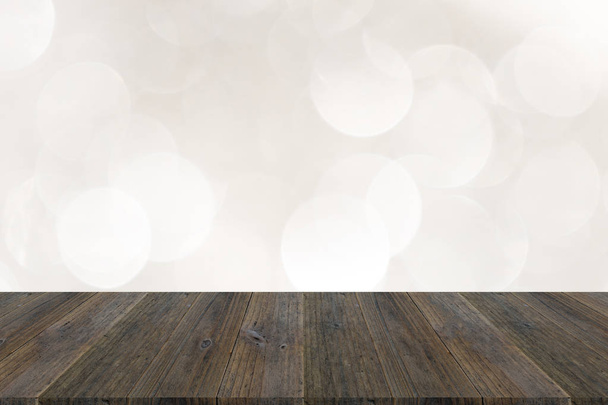 Abstract bokeh of light with wood terrace - Photo, Image
