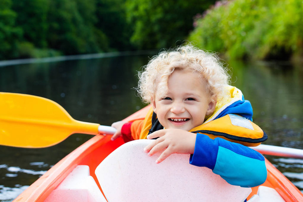 Little boy in kayak - Photo, image