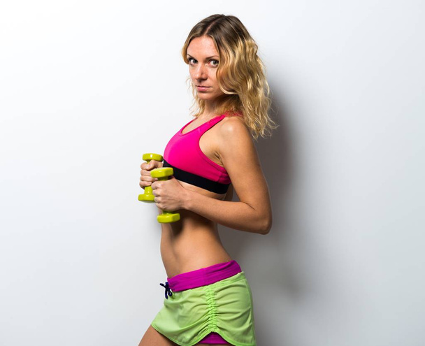 Sport donna fare sollevamento pesi
 - Foto, immagini