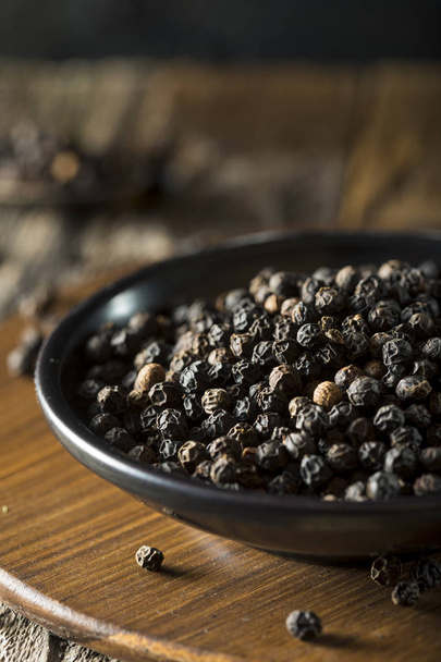 Raw Organic Black Peppercorns - Фото, зображення