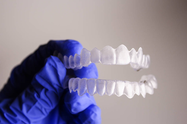 Dental orthodontics held by dentists hand - Photo, Image