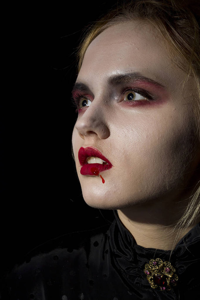 Young girl vampire - Foto, Imagen