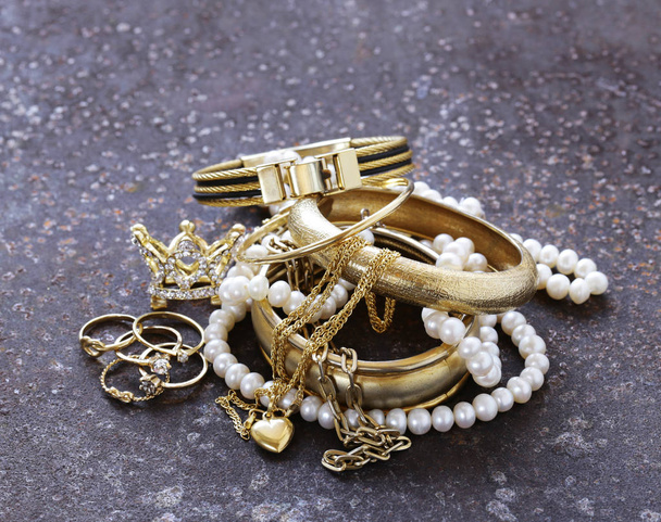 gold jewelry and pearls, bracelets and chains - Photo, Image