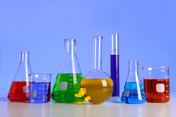 Laboratory Glassware Over Blue Background - Photo, Image