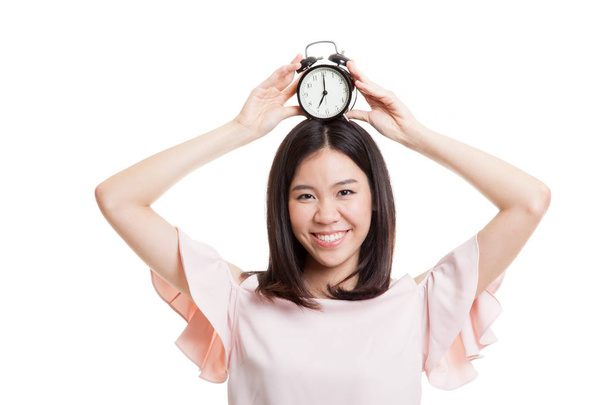 Young Asian business woman smile with a clock. - Photo, Image
