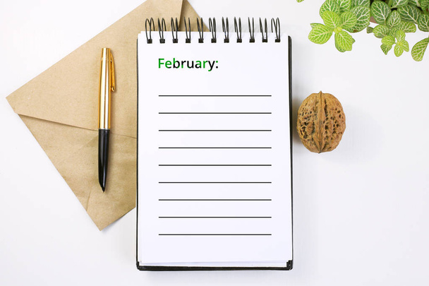 notebook. Business planning, problem solving. Plan in February - Photo, Image