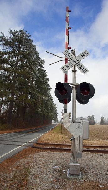 Railroad crossing and sign - 写真・画像