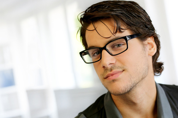 Portrait of handsome young man with glasses - Zdjęcie, obraz