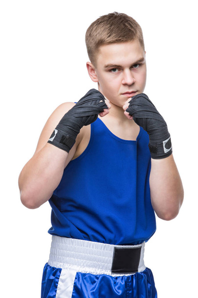 Joven boxeador deportista en traje deportivo azul
 - Foto, Imagen