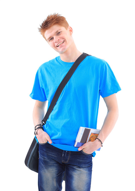 Portrait of handsome young man in casual clothes standing over w - Foto, Bild