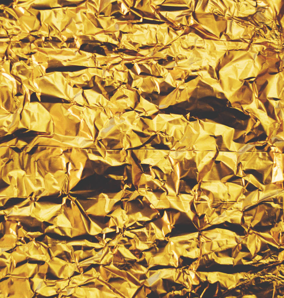 Wrinkled golden foil background - Φωτογραφία, εικόνα