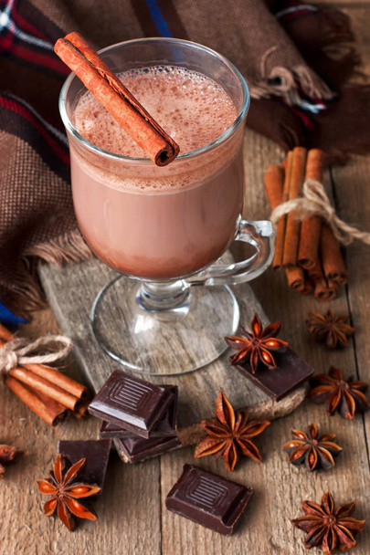 Cocoa drink in glass mug on  wooden rustic background - Фото, зображення