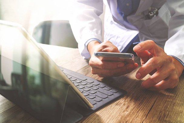smart medical doctor hand working with smart phone,digital table - Φωτογραφία, εικόνα