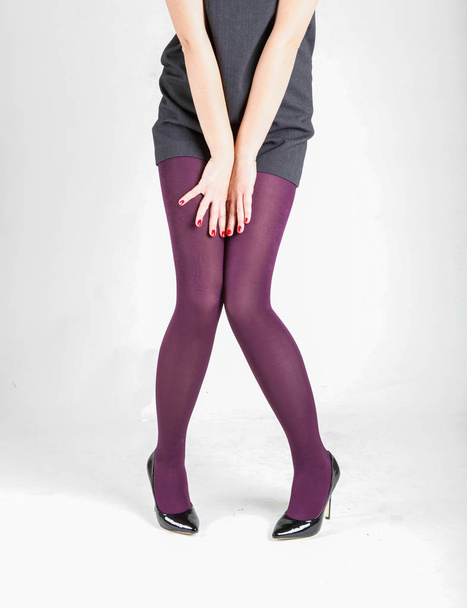 Woman's Legs Wearing Pantyhose and High Heels - Foto, imagen