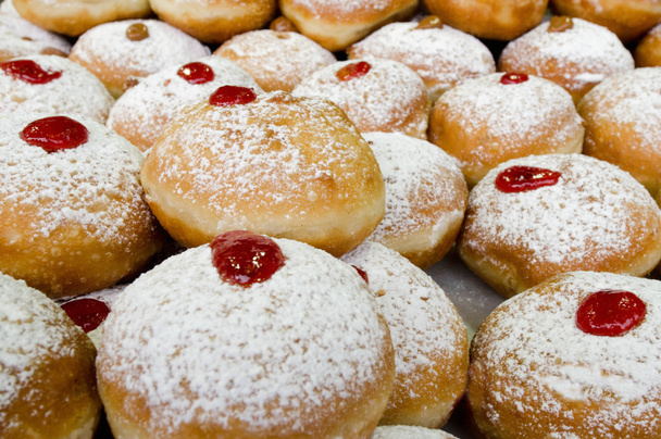 灯明祭のユダヤ人の休日の食品 - sufganiot ドーナツ - 写真・画像
