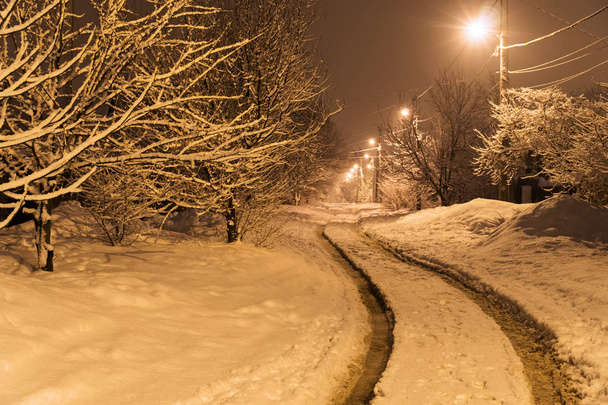 Snow-covered rural road - Fotoğraf, Görsel