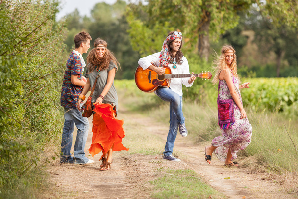 Hippie Group Playing Music and Dancing Outside - Fotoğraf, Görsel