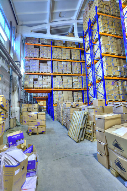 Boxes of stored records in warehouse, secure document storage facility. - Fotó, kép