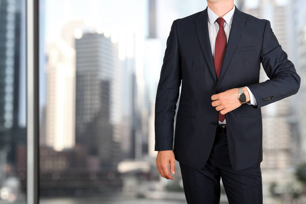 business and office concept - elegant young fashion business man in a blue/navy suit - Photo, Image