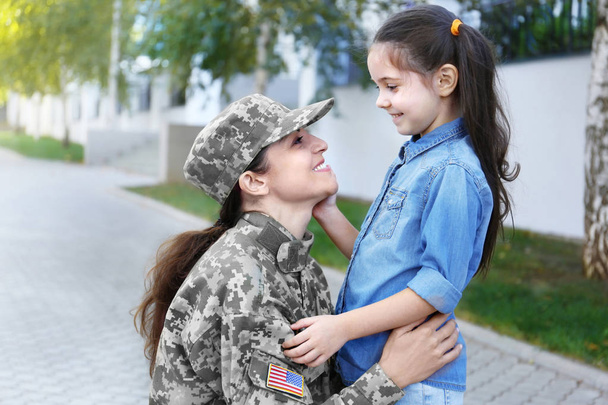 Mother in army uniform and daughter in the street - Fotografie, Obrázek