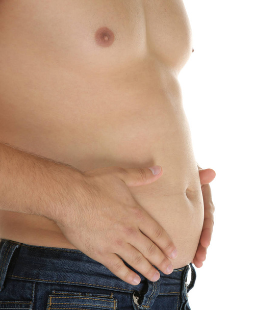 Man touching his fat belly - Foto, imagen
