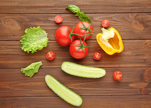Fresh vegetables on wooden table - Фото, зображення