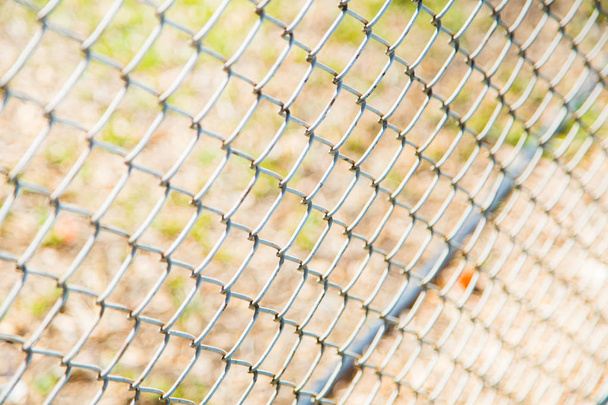 steel wire mesh fence. - Fotoğraf, Görsel