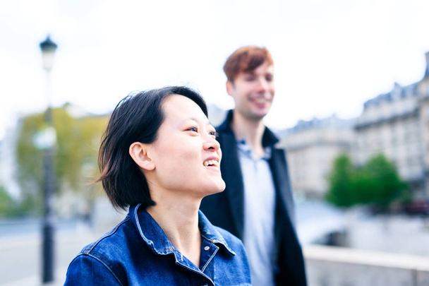 Young Multi-ethnic Couple in Paris, France - 写真・画像