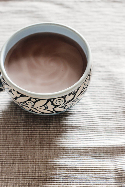 delicious cocoa in blue ceramic cup - Foto, Imagen