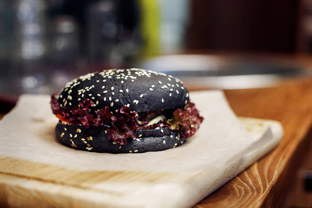 black burger. serving cheeseburger - Photo, Image